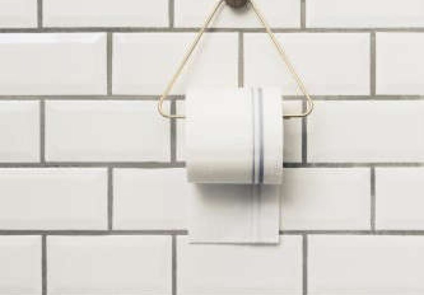 Ferm Living's Brass Toilet Paper Holder