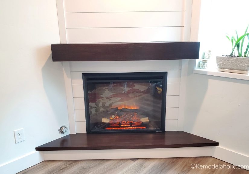How to Build a Gorgeous DIY Corner Fireplace (Plus a Mantel with Hidden Storage!)